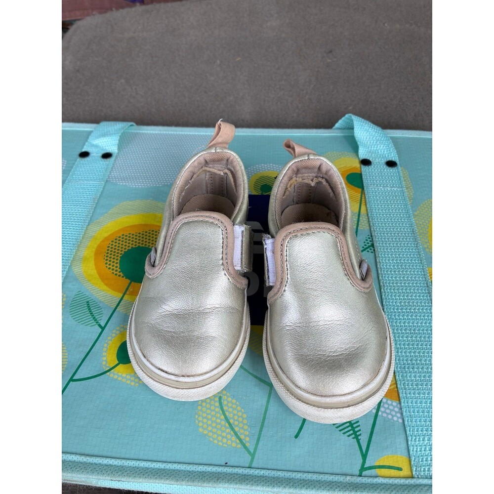 Vans Toddler Metallic Gold Slip-On Sneakers – Size 5.5
Cute pair of Vans